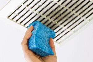 Cleaning A Dusty Vent For Better Airflow and Comfort